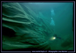 My wife Caroline - diving along the beautiful rocky forma... by Michel Lonfat 